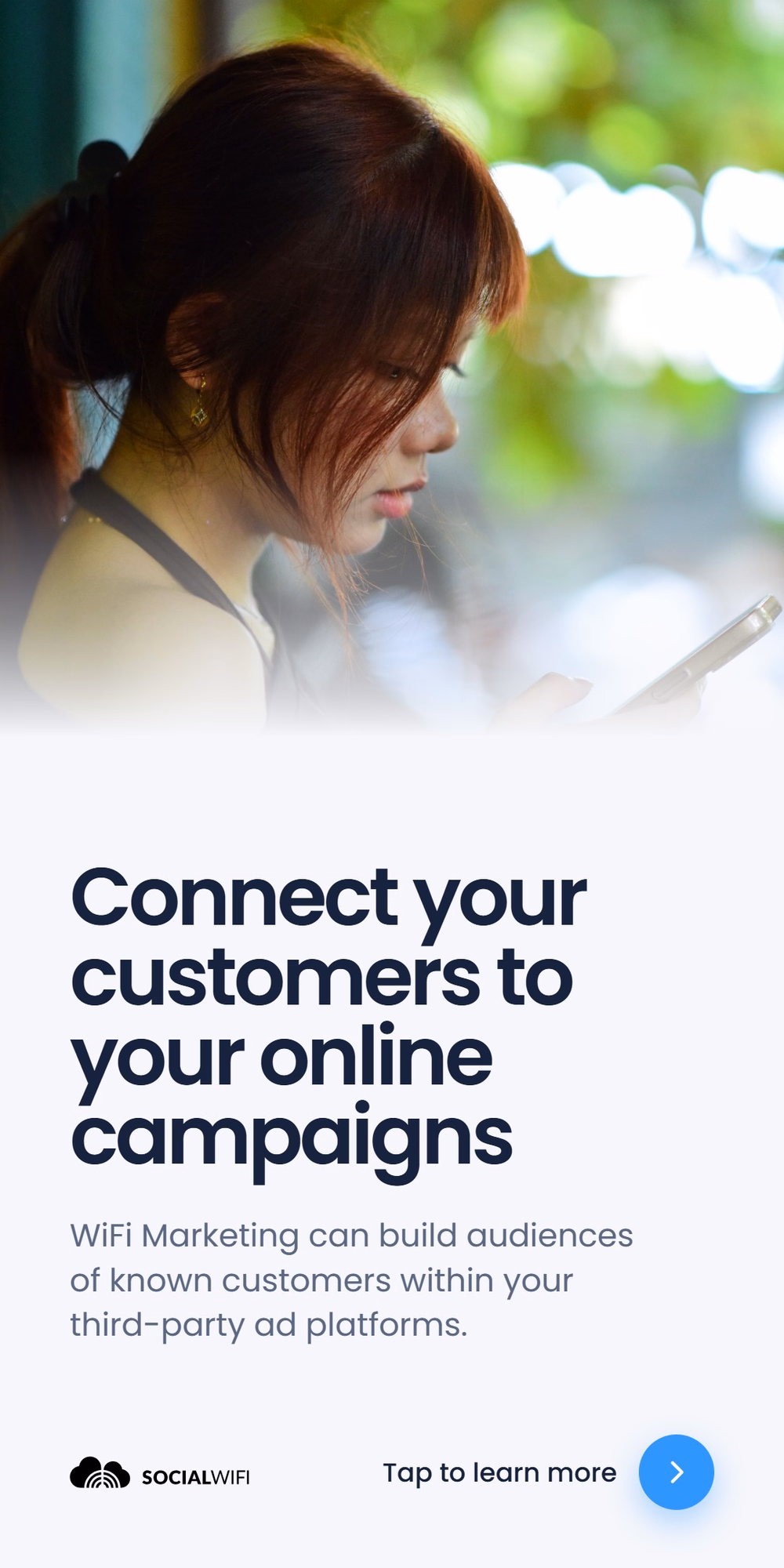 Guest checking their phone against a blurred green backdrop, with the headline 'Connect your customers to your online campaigns'