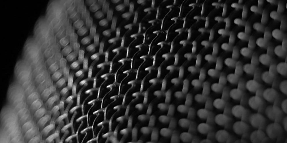 a black microphone mesh