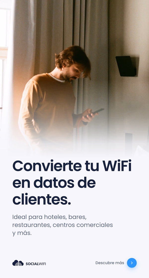 Hombre revisando su teléfono junto a un punto de acceso WiFi montado en la pared, bajo el titular 'Convierte su WiFi en datos de clientes' y el texto 'Ideal para hoteles, bares, restaurantes, centros comerciales y más'
