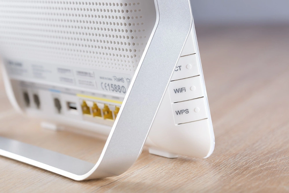 white router standing on a table